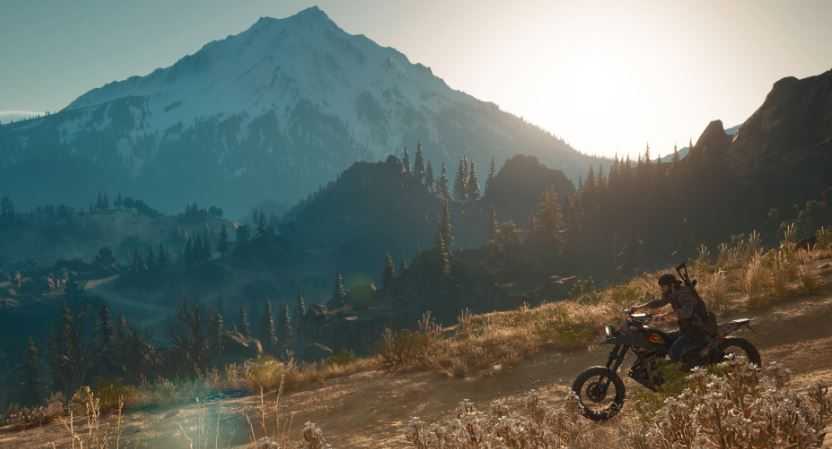 Дикон едет на мотоцикле по горам Орегона.
